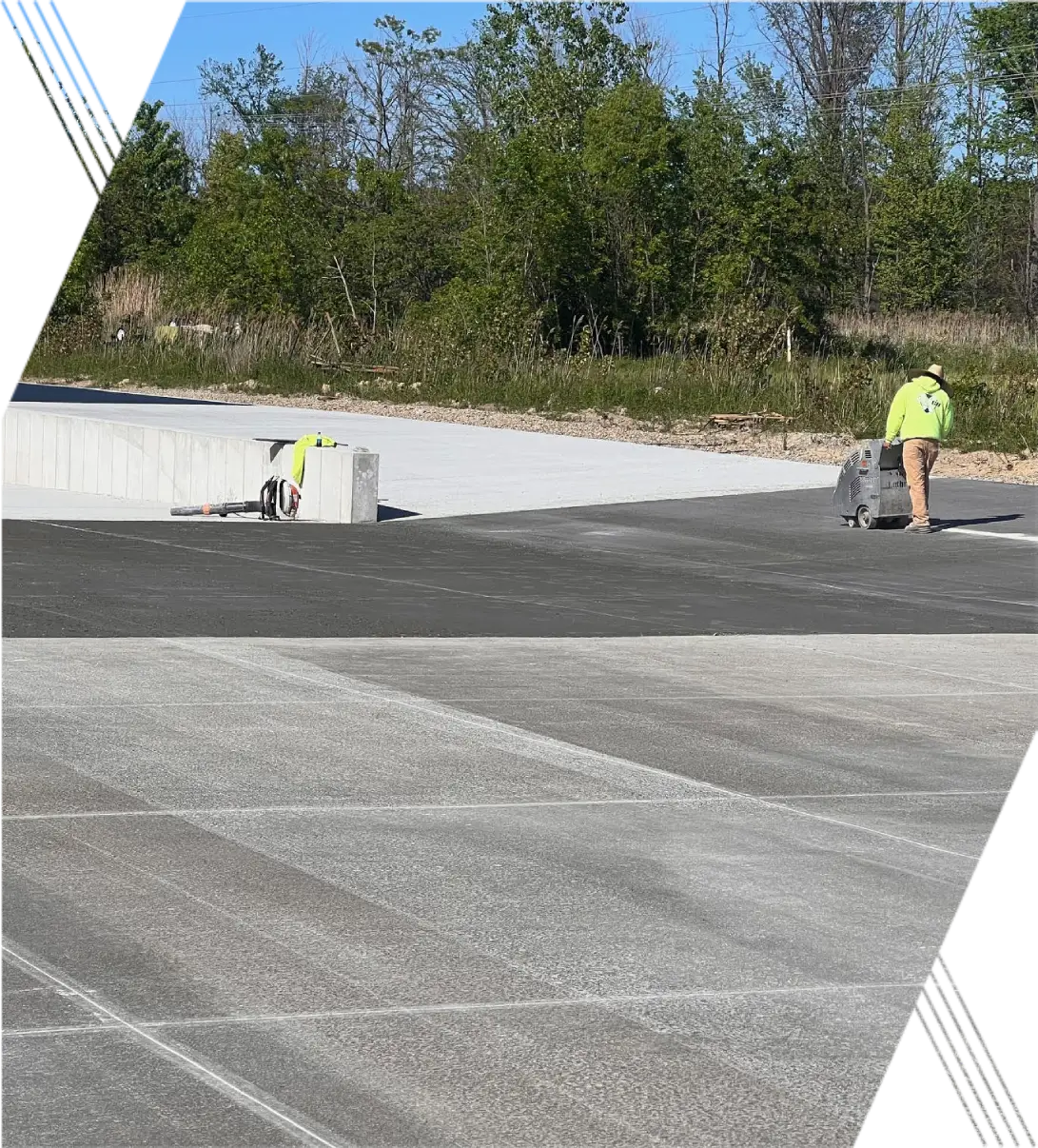 conceret (1) (1) Close-up view of smooth, freshly poured concrete floor."